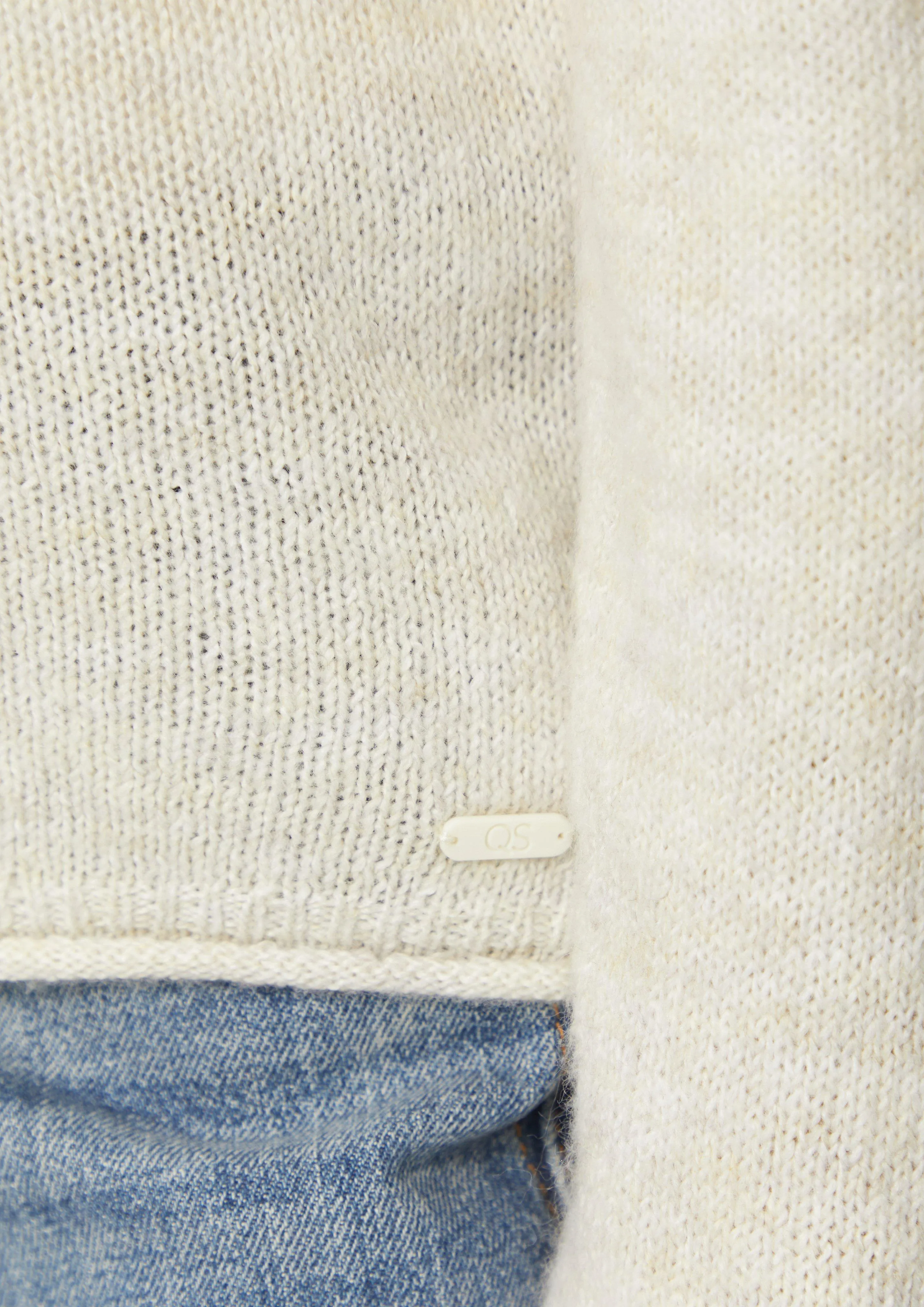 Soft knitted jumper with openwork details